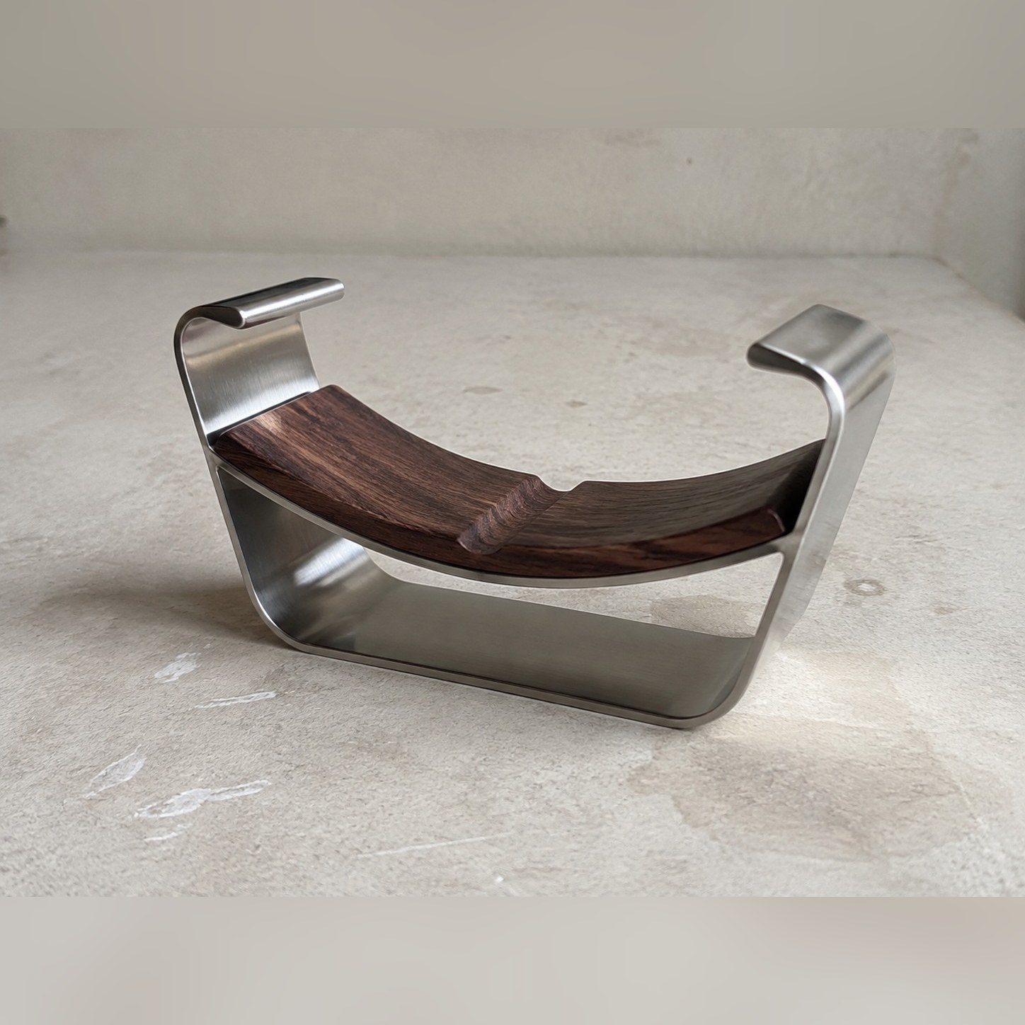 Spectacle Saddle — Stainless steel 304 · Dark-stained wood saddle · Mechanically polished, XANVOR, Moradabad